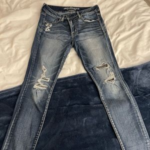 Woman’s American Eagle Distressed Dark Wash Skinny Jeans - Jegging Size 12
